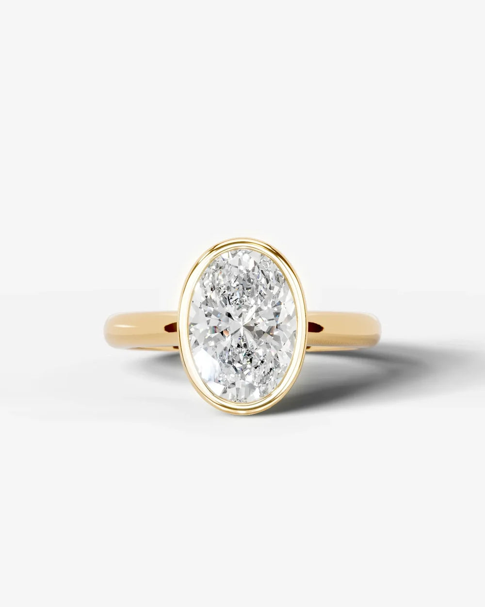 2 Carat Lab Grown Oval Cut Diamond Bezel Set Solitaire Ring