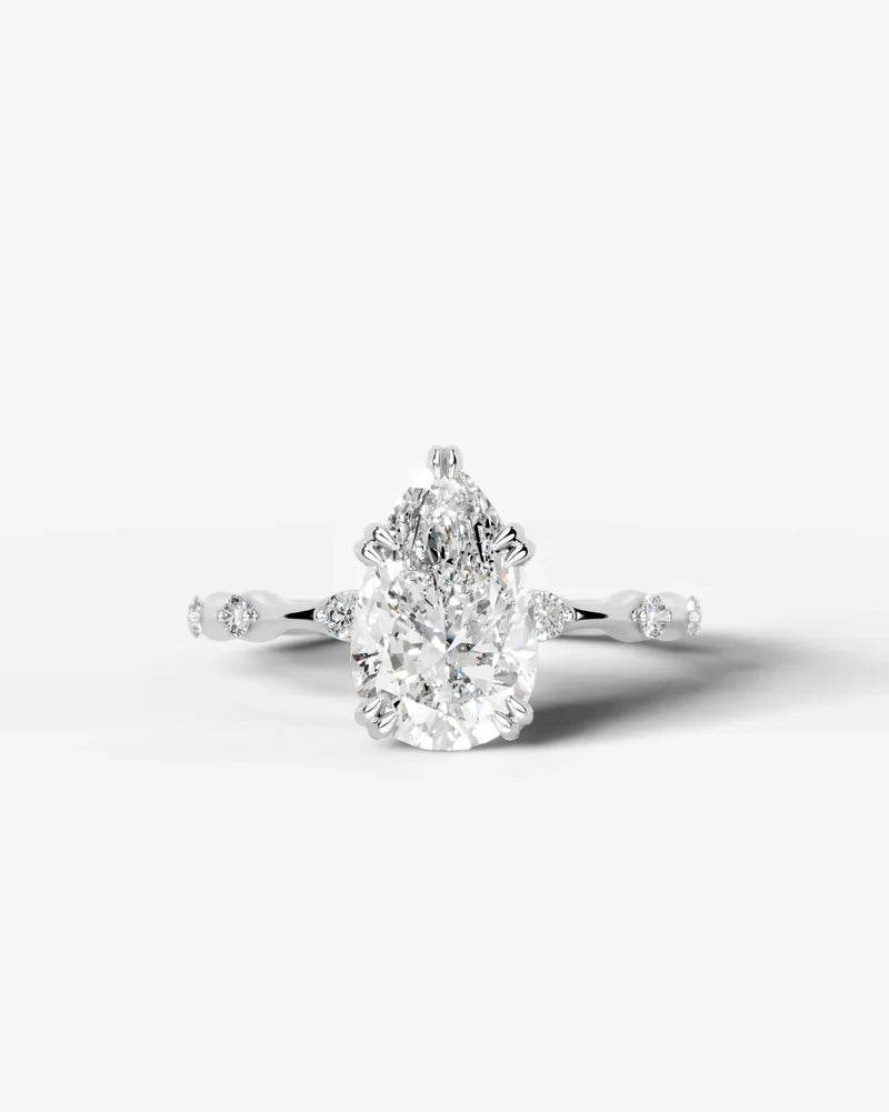 2 Carat Lab Grown Diamond Solaria Pear Cut Sidestone Engagement Ring