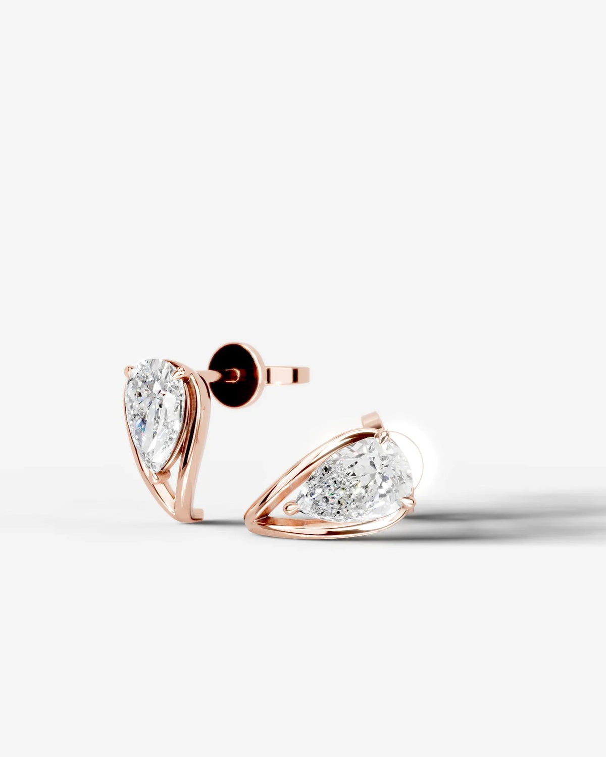 Lab Grown Diamond Pear Swirl Stud Earrings