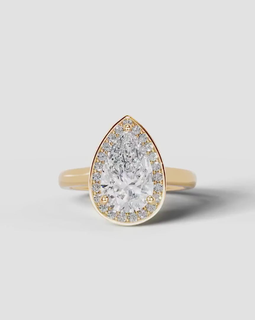 2 Carat Lab Grown Diamond Celestia Pear Cut Bezel Halo Engagement Ring