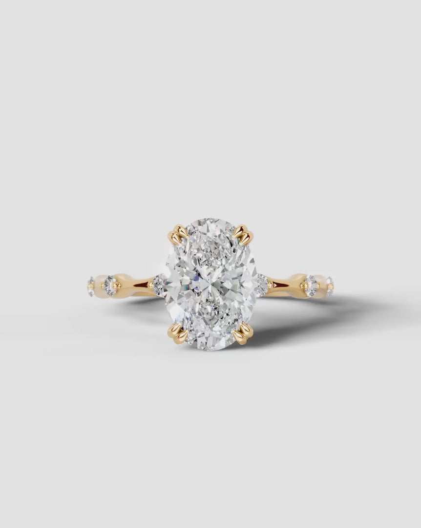 2 Carat Lab Grown Diamond Lyra Oval Cut Sidestone Engagement Ring