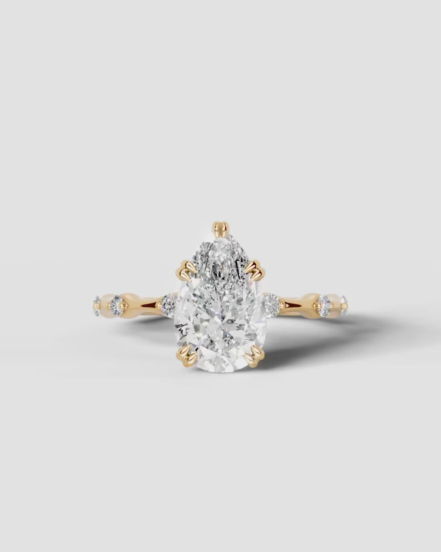 2 Carat Lab Grown Diamond Solaria Pear Cut Sidestone Engagement Ring